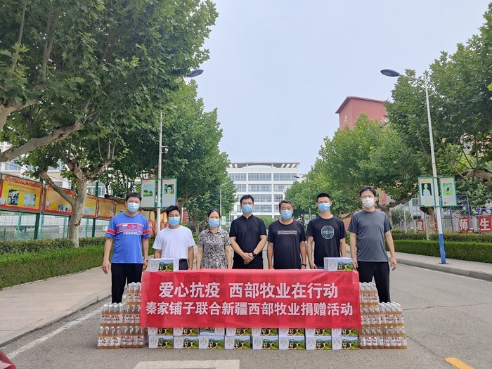 爱心企业为临沂39中捐赠牛奶_副本.jpg